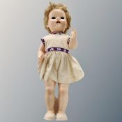 A mid-20th century plastic doll voice activation.