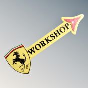 A cast iron wall plaque, Ferrari workshop.