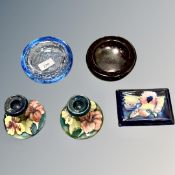 A pair of Moorcroft candlesticks,