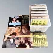 A crate containing vinyl records including world music, classical etc.