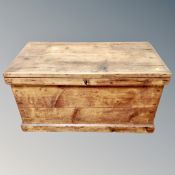 An antique pine blanket chest.