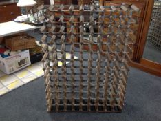 A metal wooden bottle rack