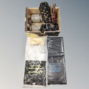 A box of garden lawn spikes, hand tools,