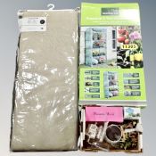 A garden line four tier grow house together with a two seater garden bench cushion,