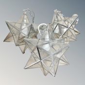 Three metal and glass wall lights