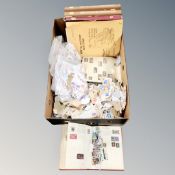 A box of vintage and later stamp albums containing world stamps,