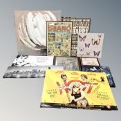 A 'Some Like It Hot' movie poster mounted on board, together with wall canvases and framed pictures.
