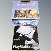 A Sony play station, boxed,