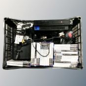 A box of two Sony Play station II consoles,