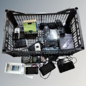 A crate of assorted vintage and later mobile phones, Nokia, Samsung, Sony,