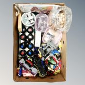 A box of marbles, carpet bowls, die cast and plastic vehicles,