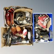 Three boxes of vintage car parts, steering wheel,