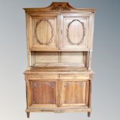 A Continental walnut sideboard,