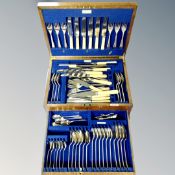 A 20th century canteen of cutlery with original sale receipt