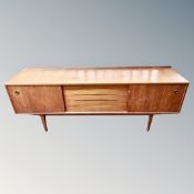 A mid century teak low sideboard,