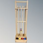 A croquet set on stand