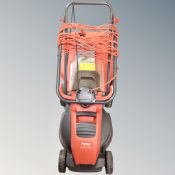 A Flymo electric lawn mower