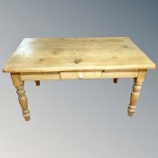 A Victorian style pine farmhouse table fitted a drawer,