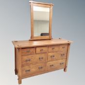 A contemporary multi drawer chest, width 149cm,