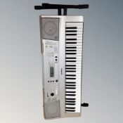 A Yamaha electric keyboard on stand (no lead)