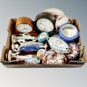 A box of figurines, mantel clock, Ringtons caddy,