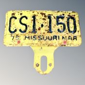 A vintage tin registration plate