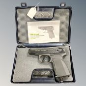 A Baikal MP-654K .177 CO2 powered air pistol in hard carry case.