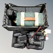 A crate containing four pairs of field glasses, Chinon, Olympus,