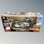 A New Bright radio controlled Harley Davidson Fatboy motorcycle, boxed.