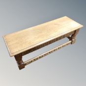A rectangular oak low table,