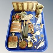 A tray of taxidermy blue tit, hip flask, shoe horn, letter opener, medals, Ford car badge,