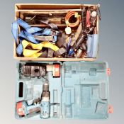 A box of power tools, harnesses,