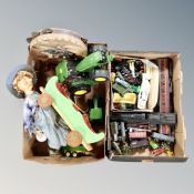 Two boxes containing model trains, rolling stock, Thomas the Tank Engine toys, wooden cart,