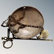 A Butcher's brass yard scale and counter weight