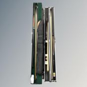 A two piece Jian Ying billiards cue in fitted box with extension and chalks,