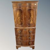A mahogany cocktail cabinet