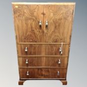 A 1920's walnut linen cabinet,