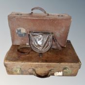 Two vintage leather suitcases and a leather bag