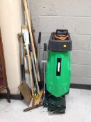 An electric garden shredder together with a quantity of tools