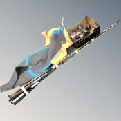 A bundle of assorted fishing rods together with box of reels, Shakespeare and Ryobi,