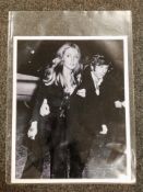 A 20x16 inch print of Sharon Tate with Roman Polanski in 1968.