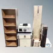 Two faux leather media storage shelves together with a Baximat De Luxe projector in case, screen,