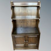 An Ercol oak bookcase