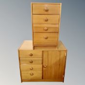 A pine four drawer chest and a cabinet fitted with drawers