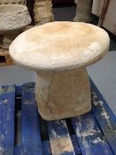 A concrete staddle stone