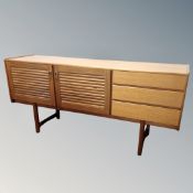 A mid century teak McIntosh & Co low sideboard