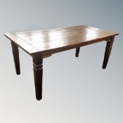 A contemporary hardwood dining table