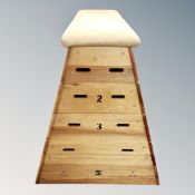 A five tier gym vault