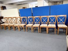 Ten contemporary dining room chairs in striped fabric