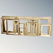 Ten assorted gilt picture frames.